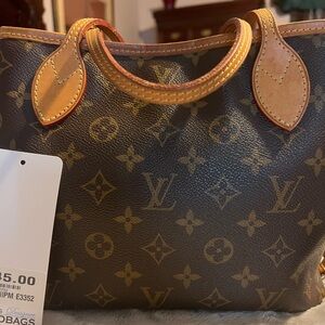 Louis Vuitton Never full hand bag